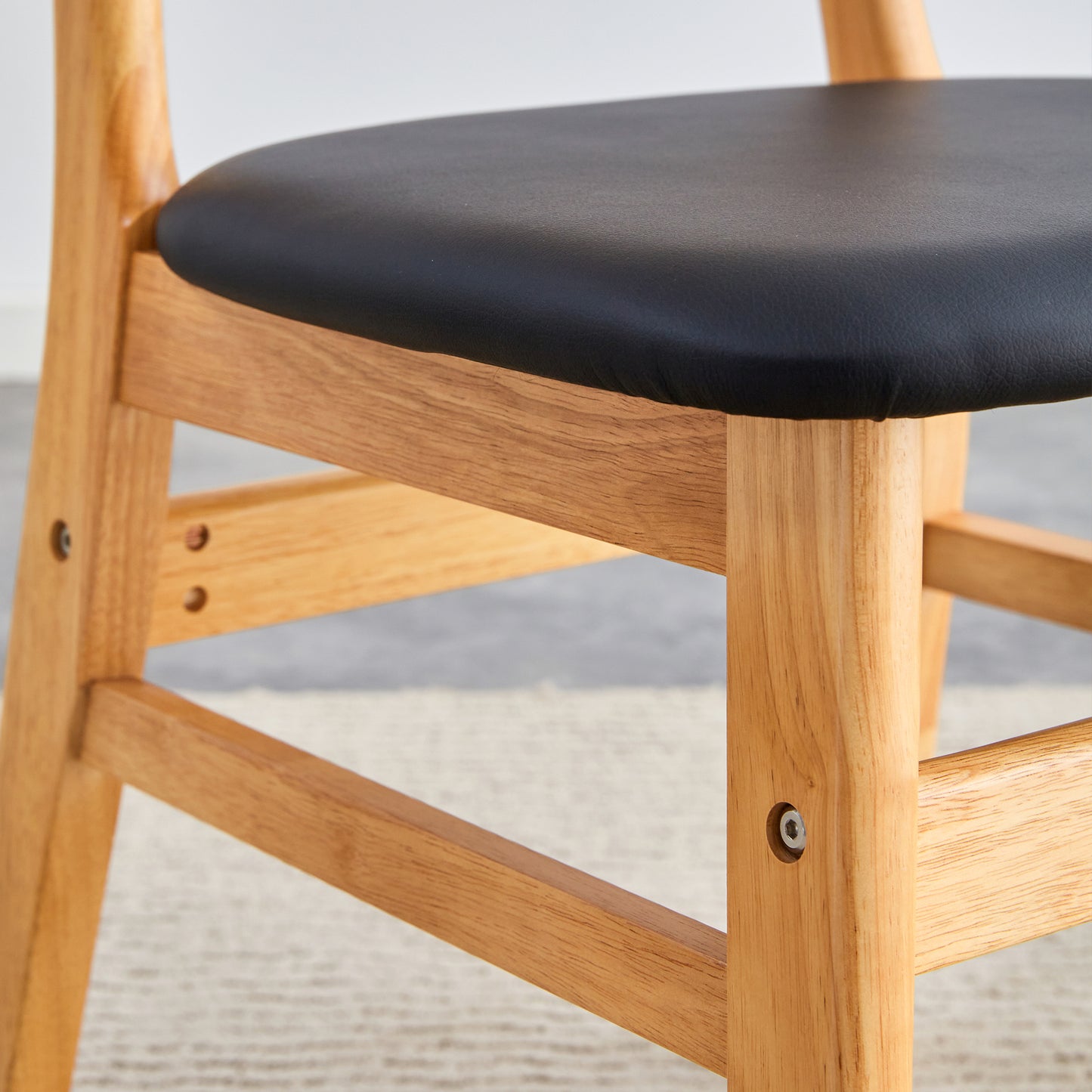 Table and chair set. White sintered stone tabletop, rubberwood legs, foldable computer desk, foldable desk. Solid wood dining chair with small curved backrest and PU cushions. ZD-1545 DX-2361